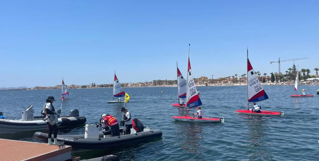 Topper Sailboats head out to race at the 2024 Topper Worlds